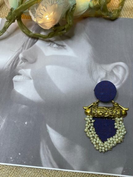 Zubeda purple fabric festive studs